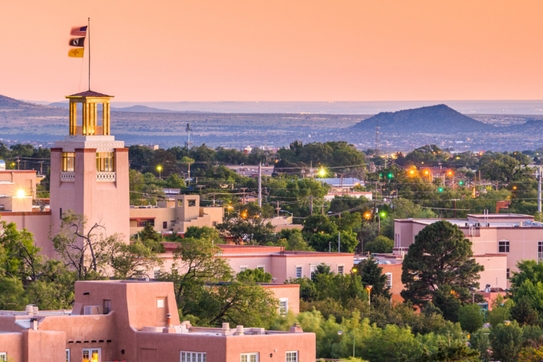 Image of Santa Fe, New Mexico skyline at dusk.